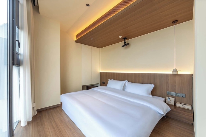 Imagen de la habitación del Hotel Shuangta Market TTD Tangtangdi. Foto 13