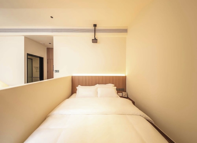 Imagen de la habitación del Hotel Shuangta Market TTD Tangtangdi. Foto 14