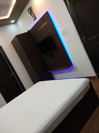 Imagen de la habitación del Hotel Shubh, Kanpur. Foto 5