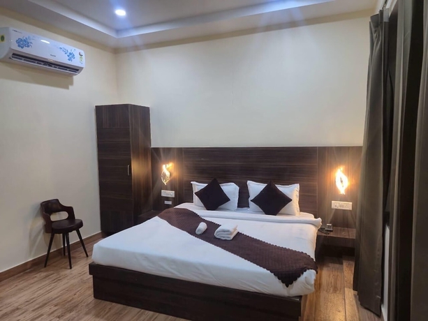 Imagen de la habitación del Hotel Shubh Mangal Grand. Foto 5