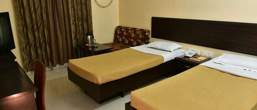 Imagen de la habitación del Hotel Shubh, Raipur. Foto 11