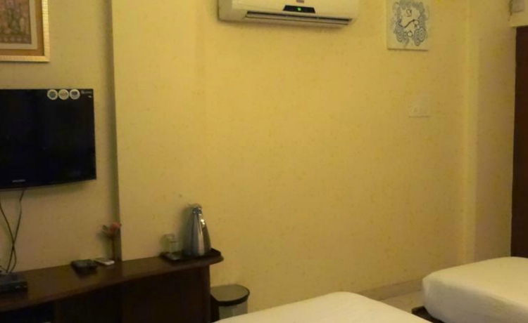 Imagen de la habitación del Hotel Shubhangan. Foto 6