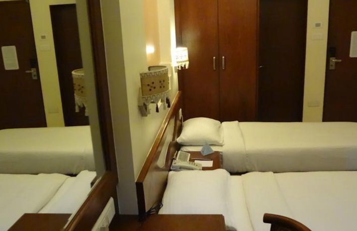 Imagen de la habitación del Hotel Shubhangan. Foto 10