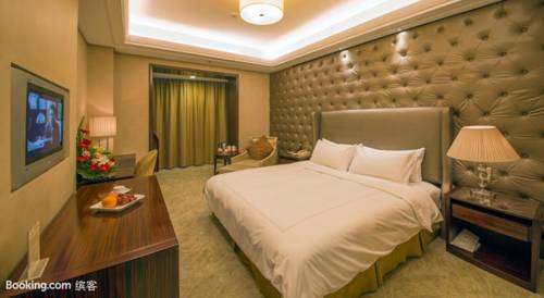 Imagen de la habitación del Hotel Shuguang International Hotel. Foto 4
