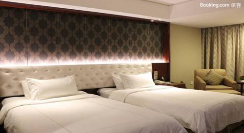 Imagen de la habitación del Hotel Shuguang International Hotel. Foto 5