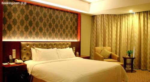 Imagen de la habitación del Hotel Shuguang International Hotel. Foto 6