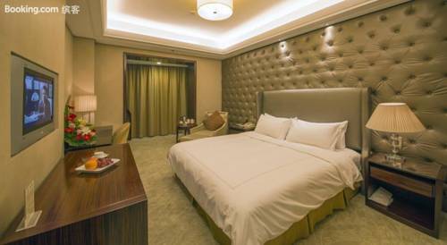 Imagen de la habitación del Hotel Shuguang International Hotel. Foto 7