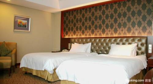 Imagen de la habitación del Hotel Shuguang International Hotel. Foto 9