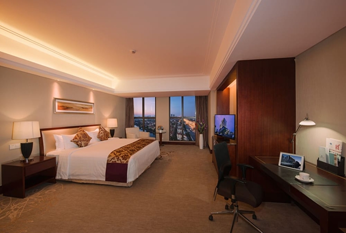Imagen de la habitación del Hotel Shuguang International Kunshan. Foto 7