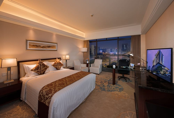 Imagen de la habitación del Hotel Shuguang International Kunshan. Foto 11