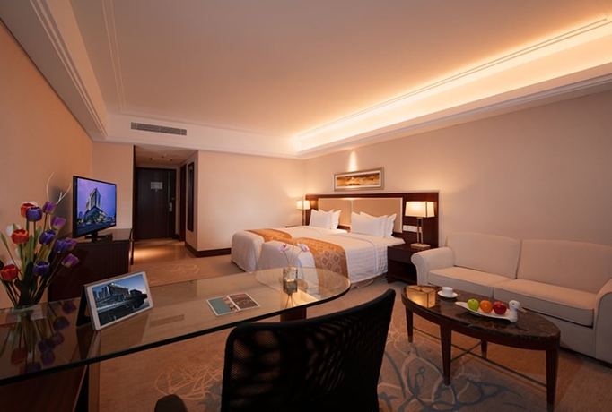 Imagen de la habitación del Hotel Shuguang International Kunshan. Foto 17