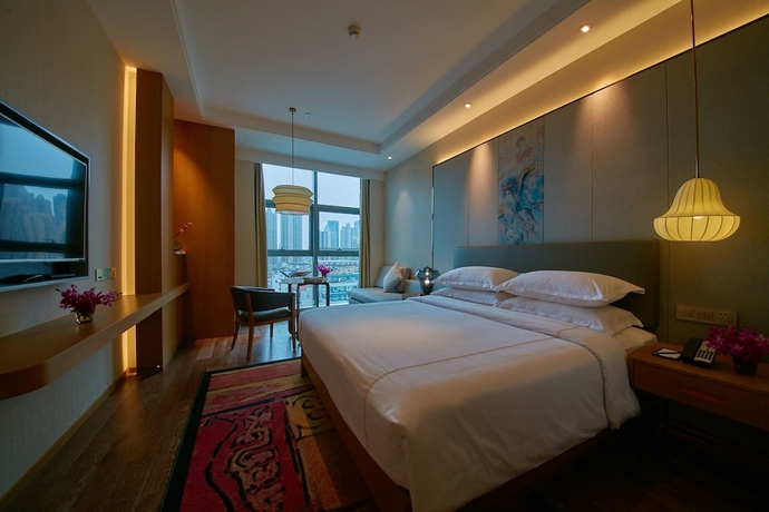 Imagen de la habitación del Hotel Shuguang The V Hefei Yaohai. Foto 12