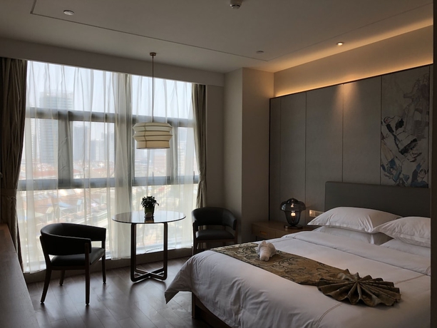 Imagen de la habitación del Hotel Shuguang The V Hefei Yaohai. Foto 13