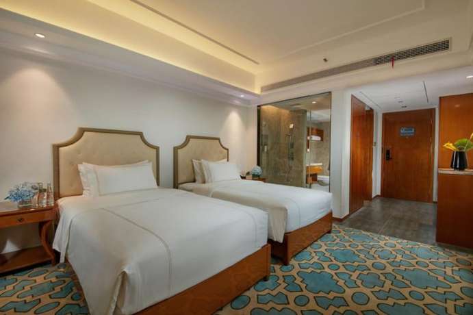 Imagen de la habitación del Hotel Shuguang The V Zhenjiang Jingkou. Foto 13