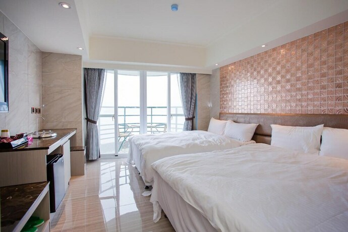 Imagen de la habitación del Hotel Shui Sha Lian. Foto 13