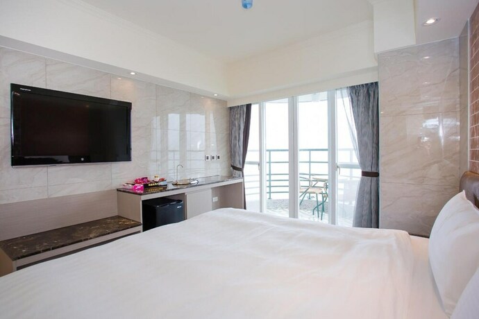 Imagen de la habitación del Hotel Shui Sha Lian. Foto 17