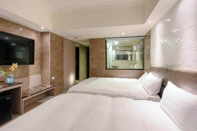 Imagen de la habitación del Hotel Shui Sha Lian. Foto 22