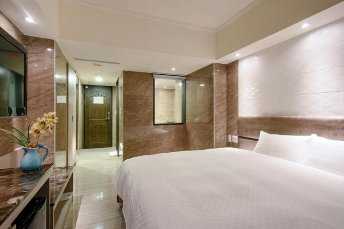 Imagen de la habitación del Hotel Shui Sha Lian. Foto 24