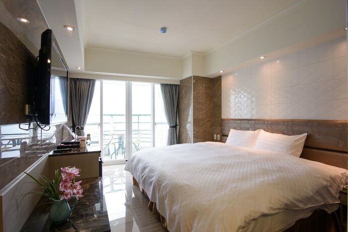 Imagen de la habitación del Hotel Shui Sha Lian. Foto 26