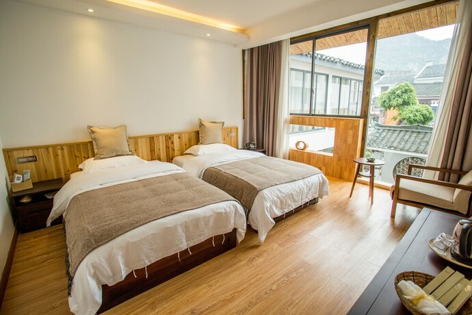 Imagen de la habitación del Hotel Shui Yun Ju Resort. Foto 13