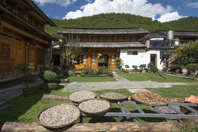 Imagen general del Hotel Shujiawuxiangluoguqingtubuminsu. Foto 2
