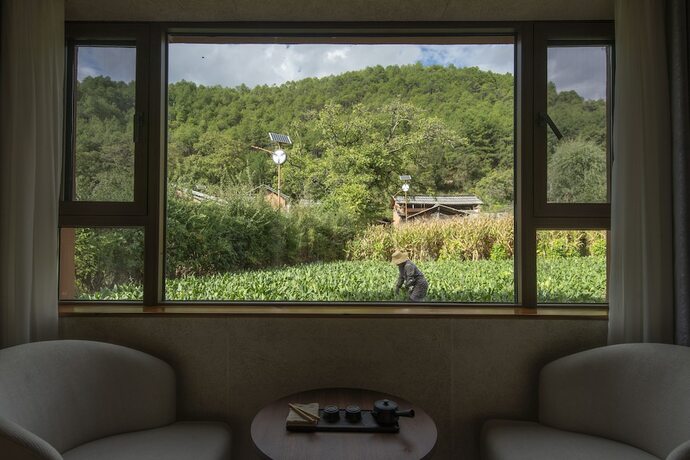 Imagen general del Hotel Shujiawuxiangluoguqingtubuminsu. Foto 7