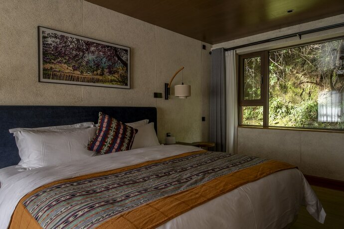 Imagen de la habitación del Hotel Shujiawuxiangluoguqingtubuminsu. Foto 14