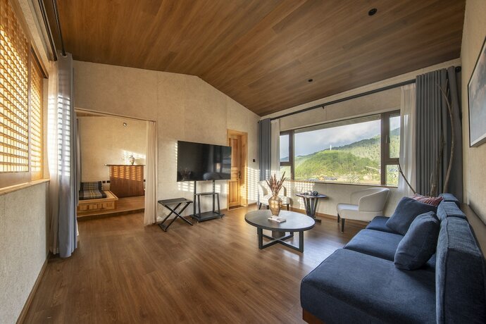 Imagen de la habitación del Hotel Shujiawuxiangluoguqingtubuminsu. Foto 18