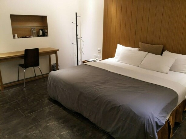 Imagen de la habitación del Hotel Shumei Chiayi. Foto 14