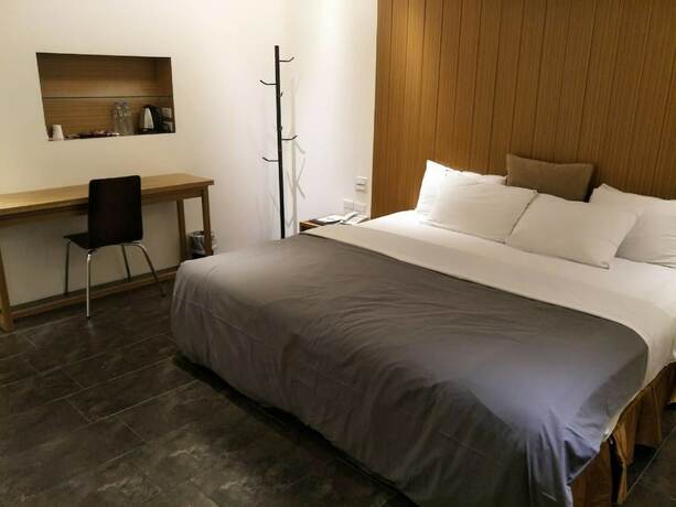 Imagen de la habitación del Hotel Shumei Chiayi. Foto 17
