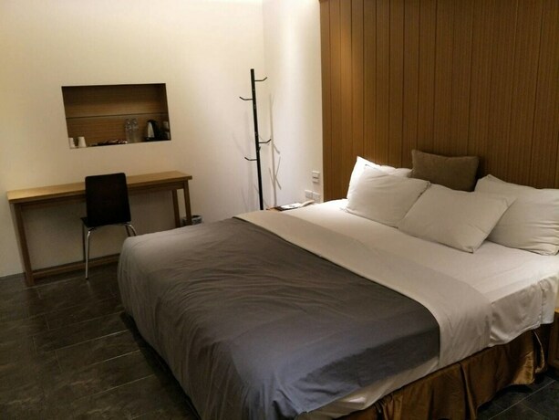Imagen de la habitación del Hotel Shumei Chiayi. Foto 22