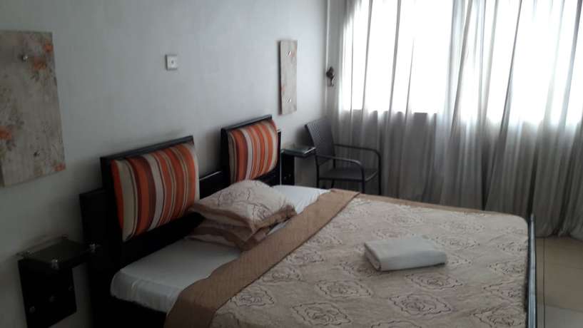 Imagen de la habitación del Hotel Shumuk and Apartments. Foto 7