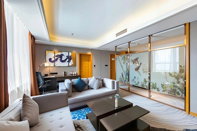 Imagen de la habitación del Hotel Shunhe Burton Liaocheng. Foto 3