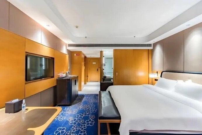 Imagen de la habitación del Hotel Shunhe Burton Liaocheng. Foto 4