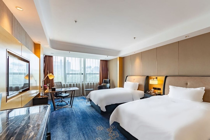 Imagen de la habitación del Hotel Shunhe Burton Liaocheng. Foto 7