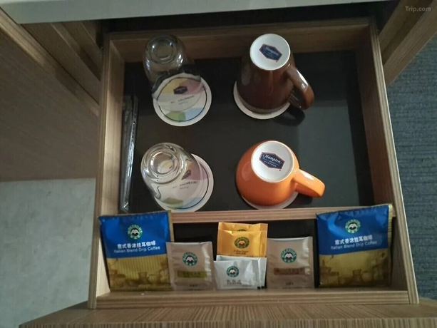 Imagen de la habitación del Hotel Shunhe Burton Liaocheng. Foto 10