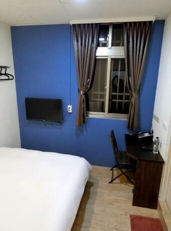 Imagen de la habitación del Hotel Shuntai Inn. Foto 11