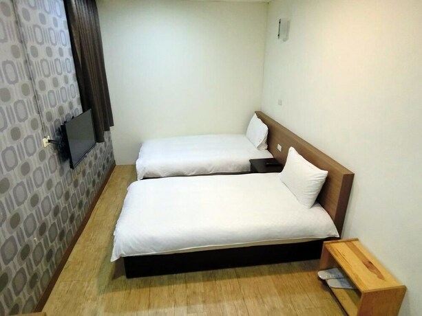 Imagen de la habitación del Hotel Shuntai Inn. Foto 15