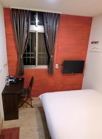 Imagen de la habitación del Hotel Shuntai Inn. Foto 18