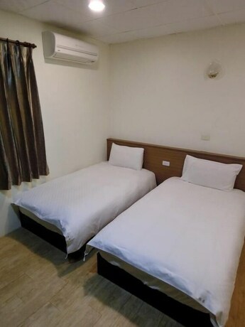 Imagen de la habitación del Hotel Shuntai Inn. Foto 19
