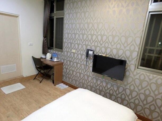Imagen de la habitación del Hotel Shuntai Inn. Foto 21