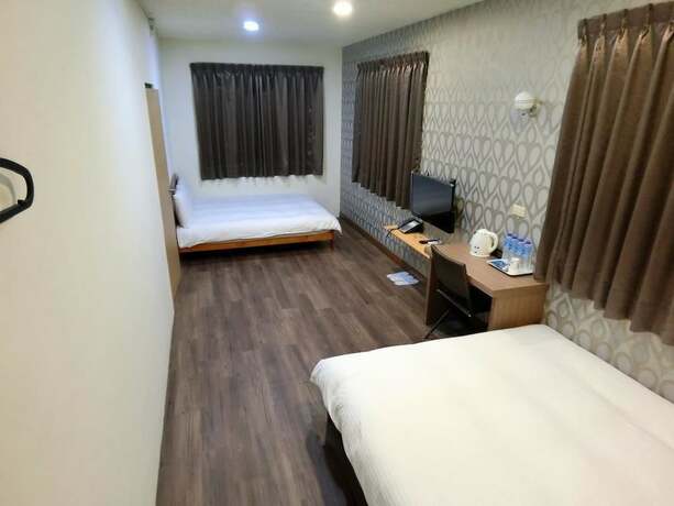 Imagen de la habitación del Hotel Shuntai Inn. Foto 22