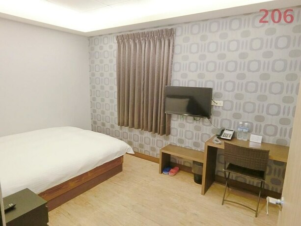 Imagen de la habitación del Hotel Shuntai Inn. Foto 24
