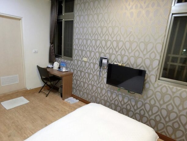 Imagen de la habitación del Hotel Shuntai Inn. Foto 25