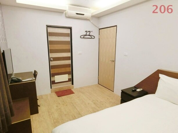 Imagen de la habitación del Hotel Shuntai Inn. Foto 27