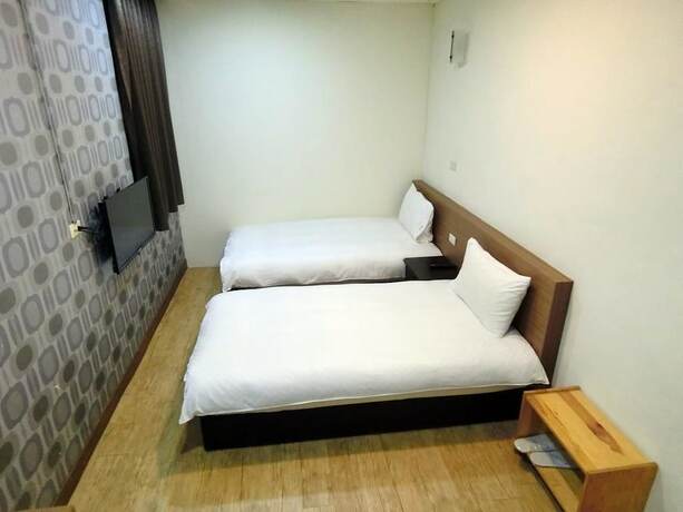 Imagen de la habitación del Hotel Shuntai Inn. Foto 28