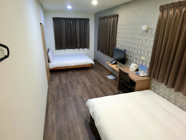Imagen de la habitación del Hotel Shuntai Inn. Foto 29