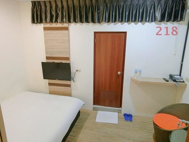 Imagen de la habitación del Hotel Shuntai Inn. Foto 32