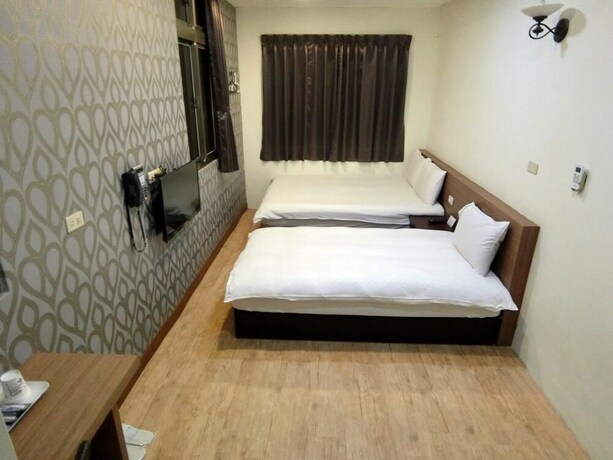 Imagen de la habitación del Hotel Shuntai Inn. Foto 34
