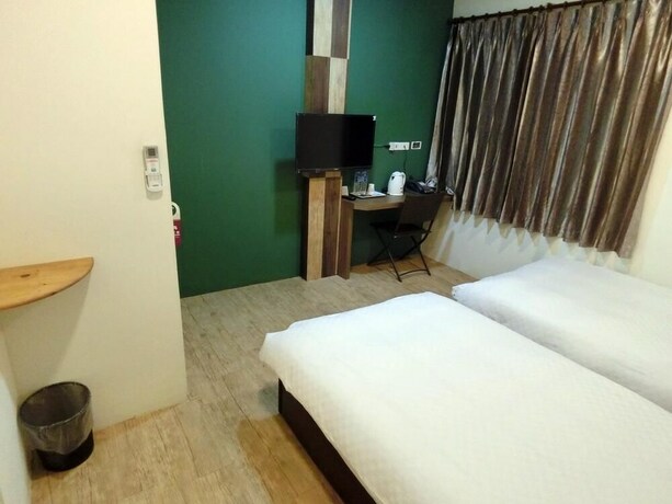 Imagen de la habitación del Hotel Shuntai Inn. Foto 35